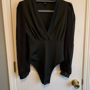 Black long sleeve body shirt. Size Small.